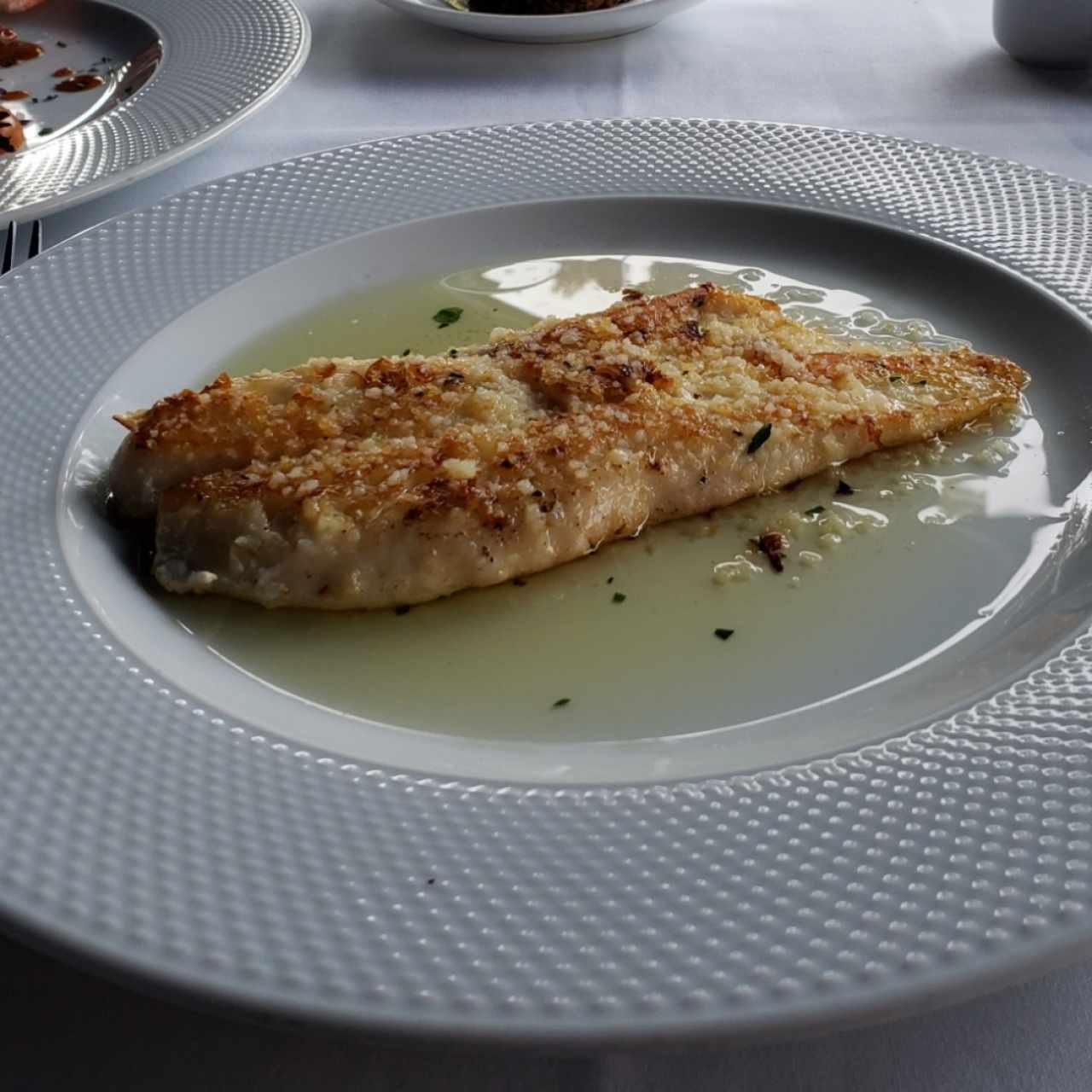 Pescado al ajillo