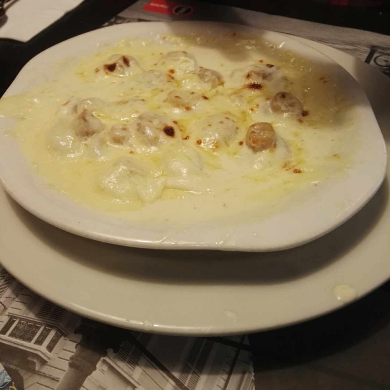 Champiñones con queso parmesano.