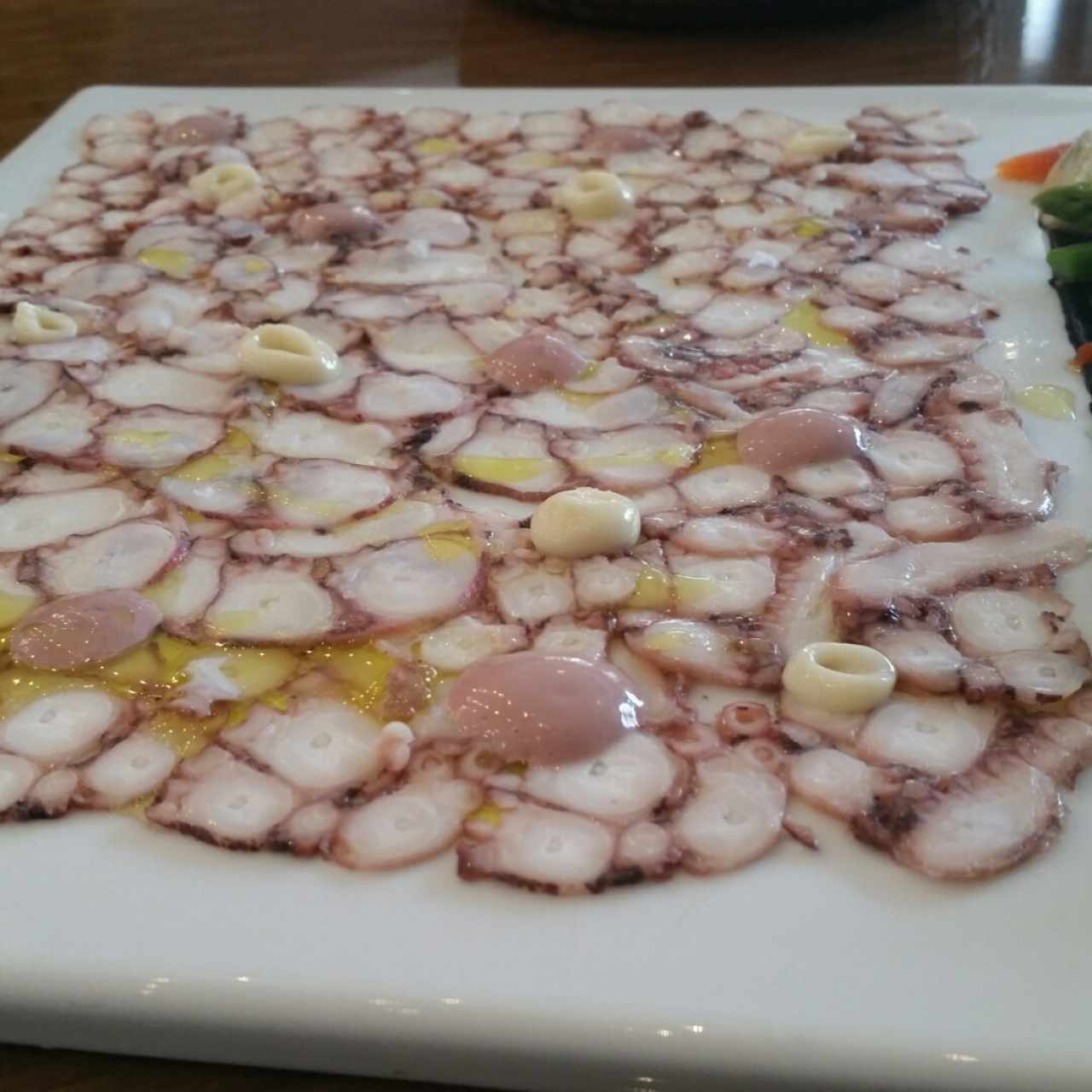 Carpaccio De Pulpo Con Vinagreta De Aceituna