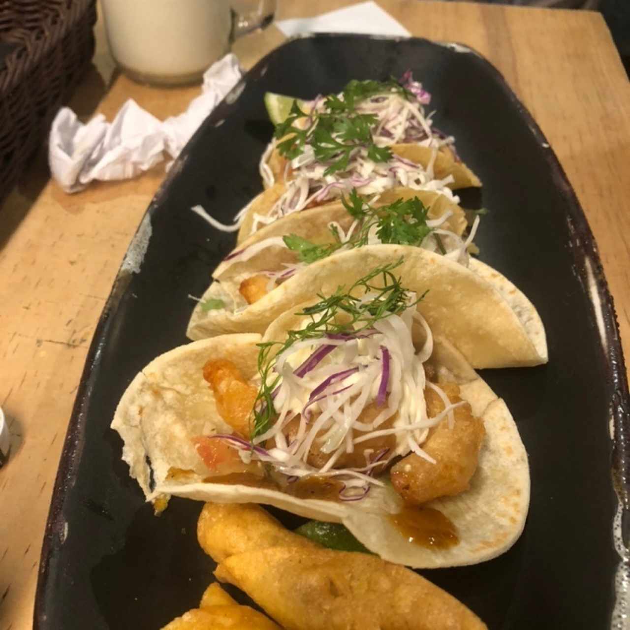 Mixto de la casa tacos y flautas 