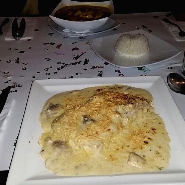 Corvina a la parmesana con champignones 