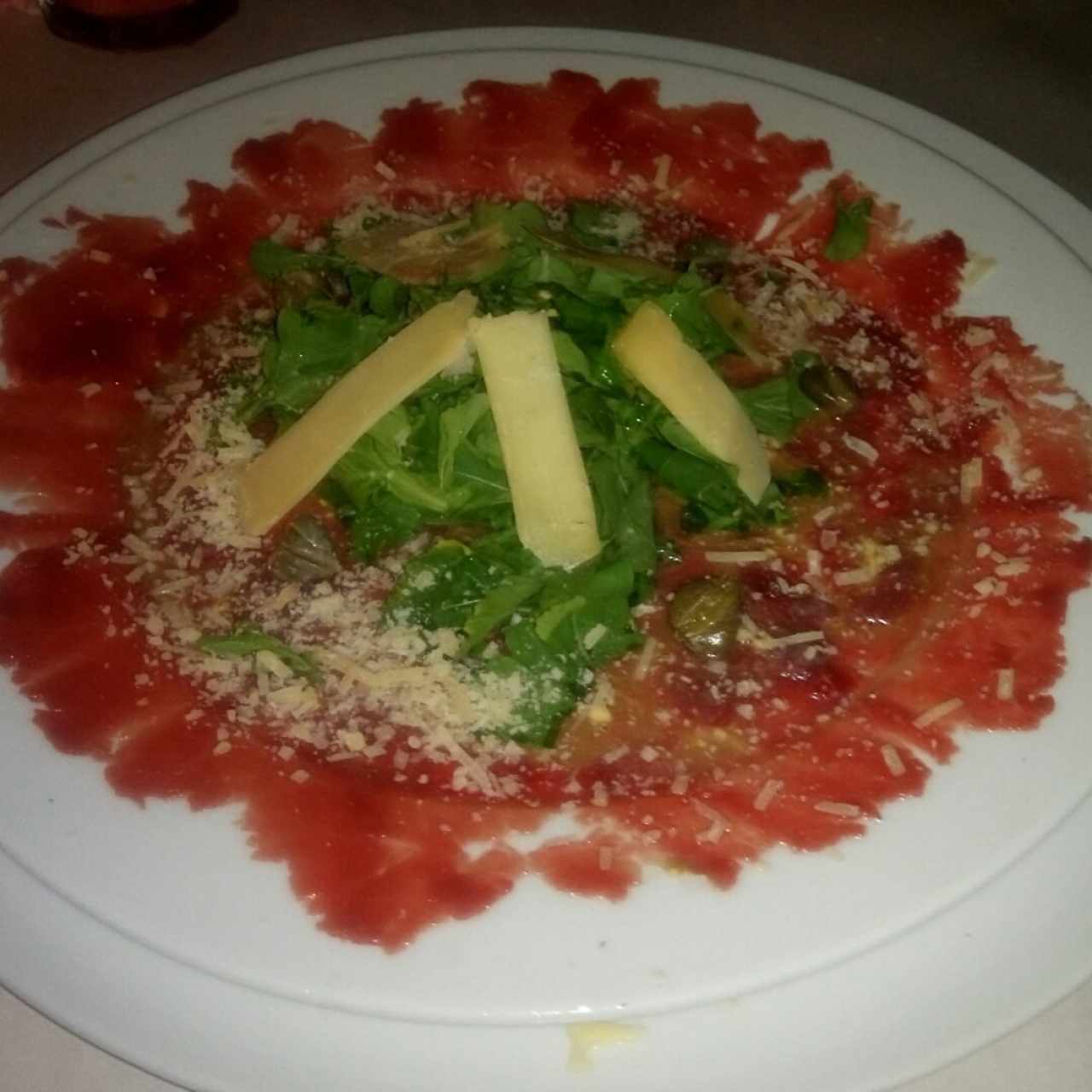 Entrada: Carpaccio de Lomo 