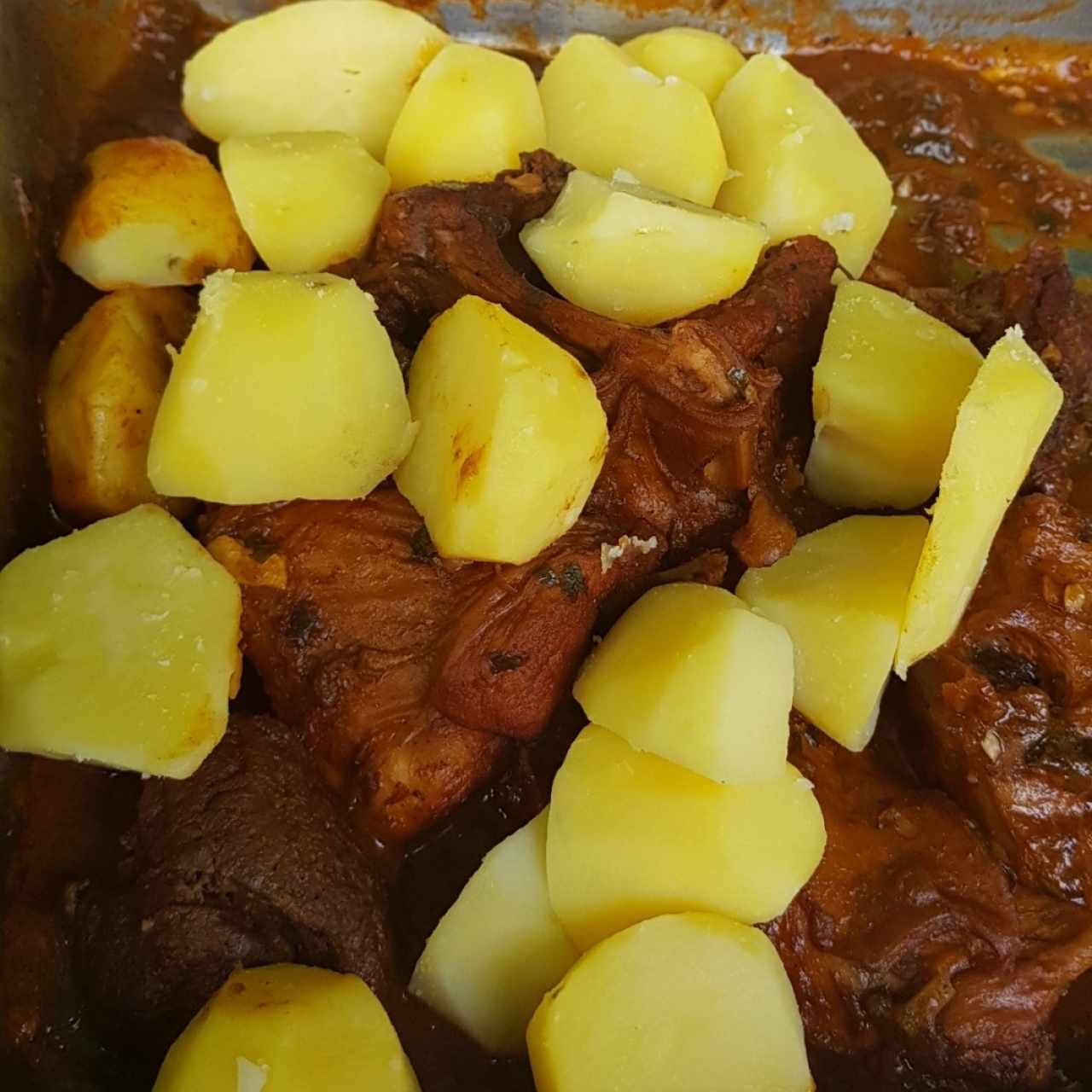 Papas y conejo.