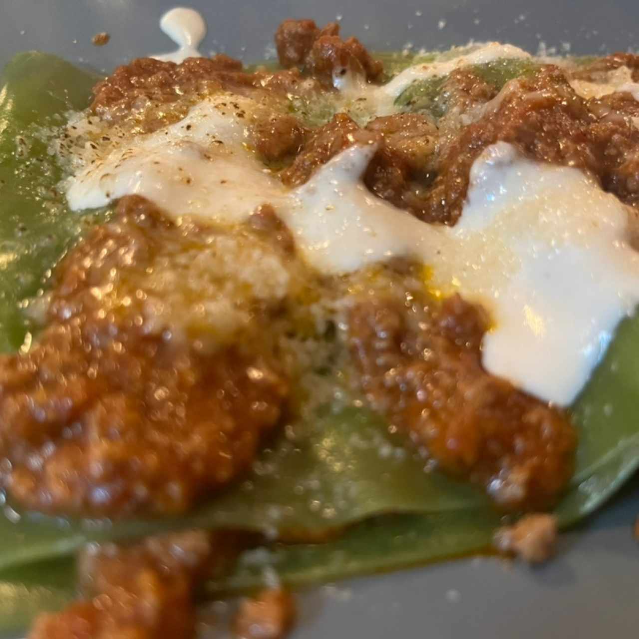Lasaña verde nada que impresiona solomelmsabor de la boloña que era buena
