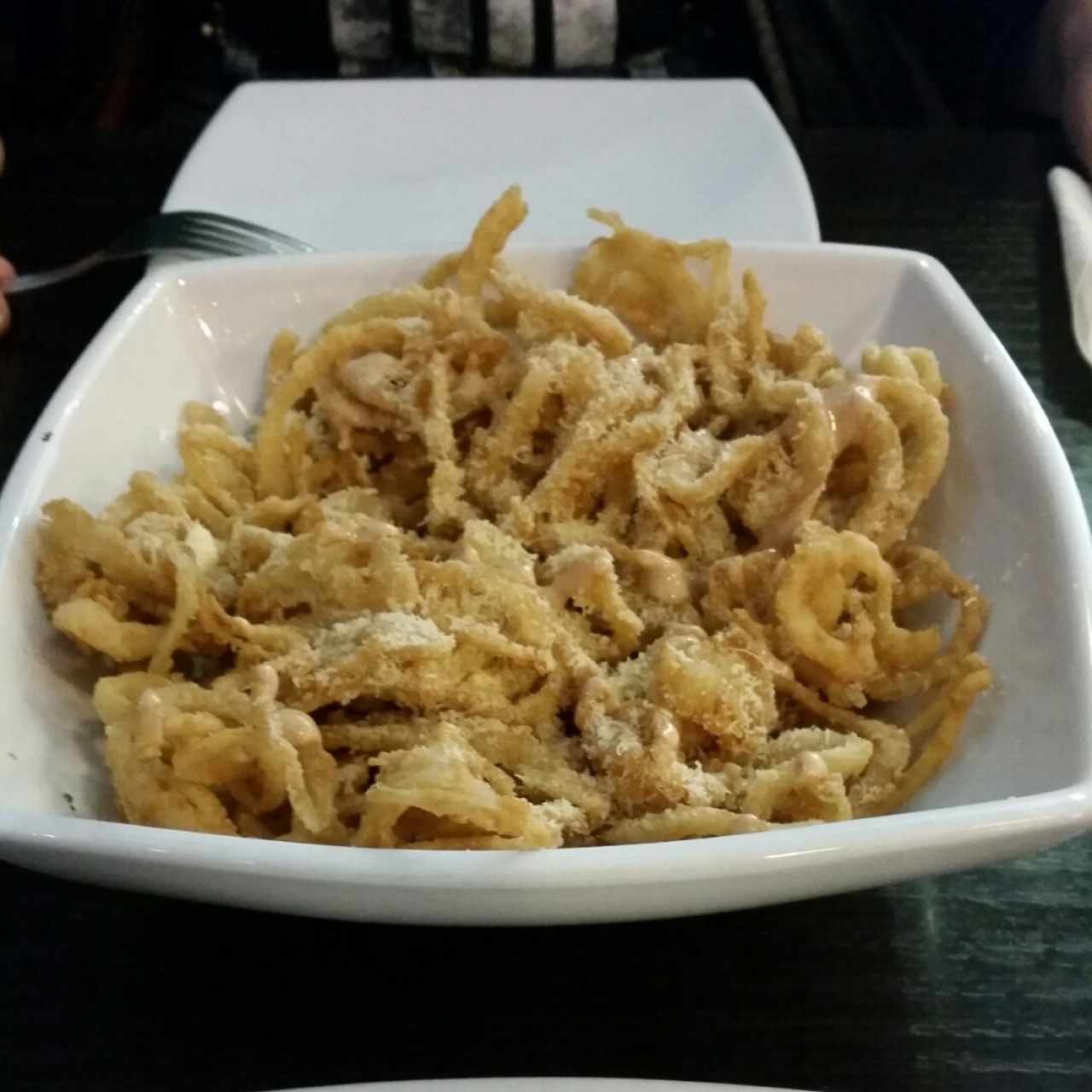 Cebollas Crujientes. Topping de parmesano.
