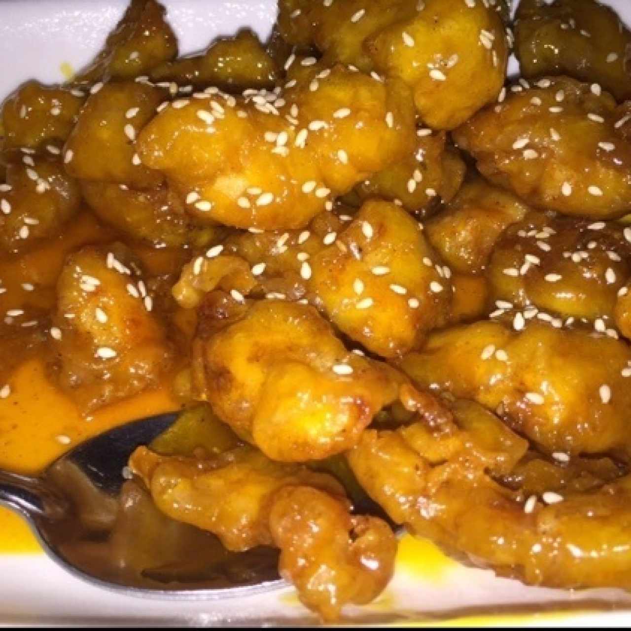 Pollo con miel y ajonjoli 