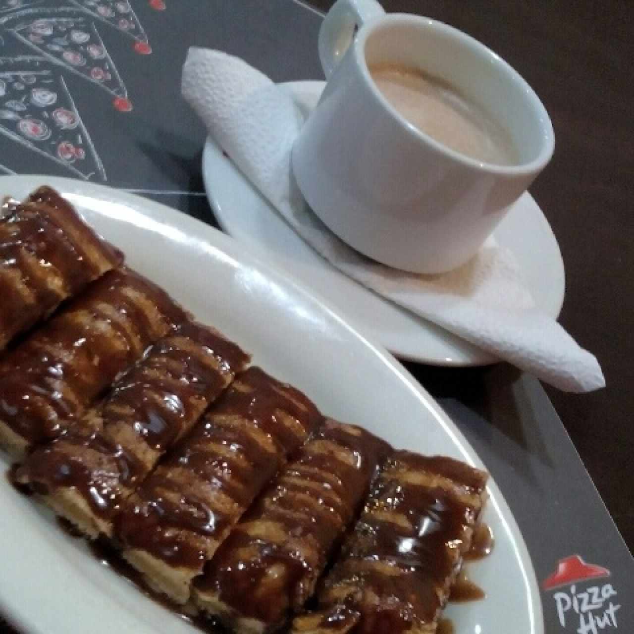 palitos con azúcar y canela y Chocolate caliente 