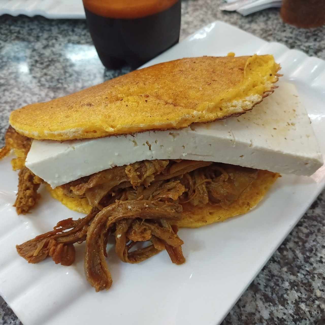 Cachapa Mechada con Palmito 