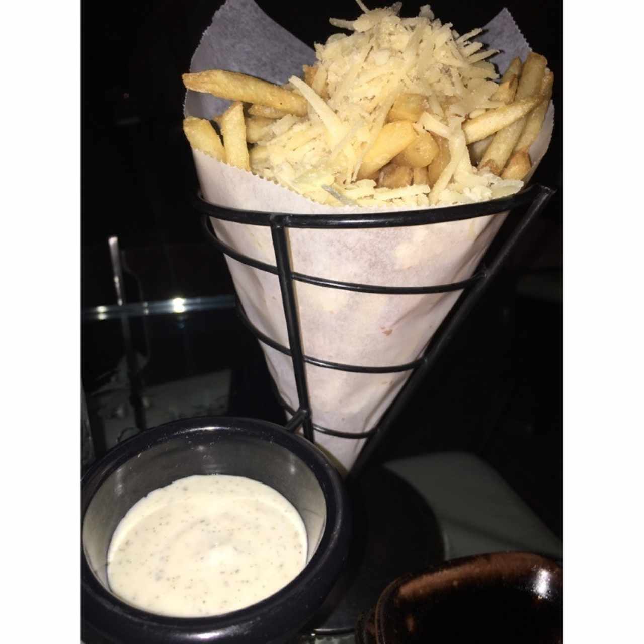 Papas con aceite de trufa y queso pecorino