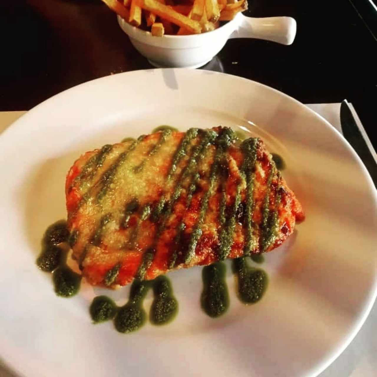 Milanesa de pollo capressa.