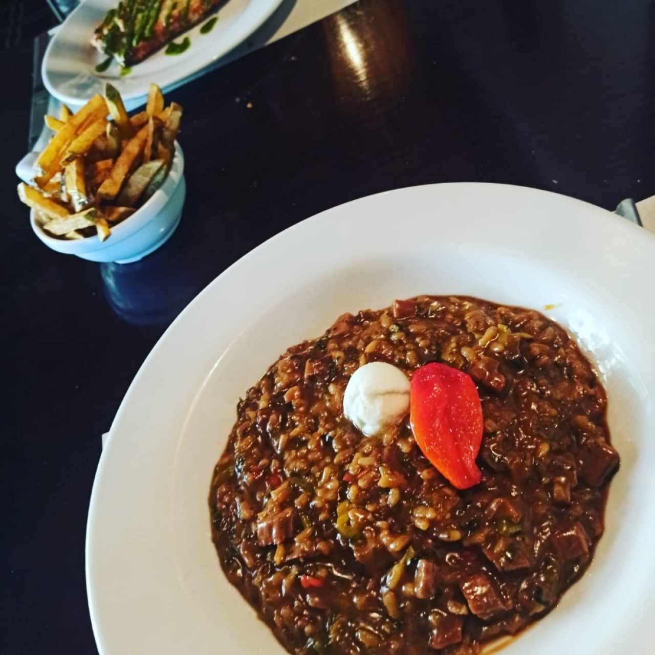 Risotto de asado negro en reducción de papelón.