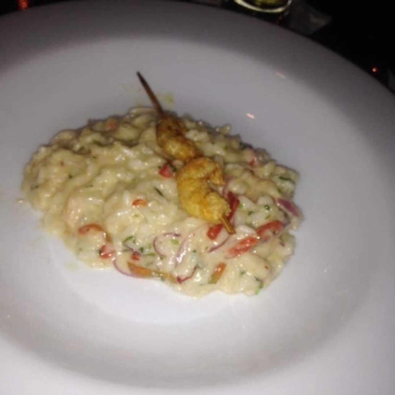 risoto de camarones y base de naranja 