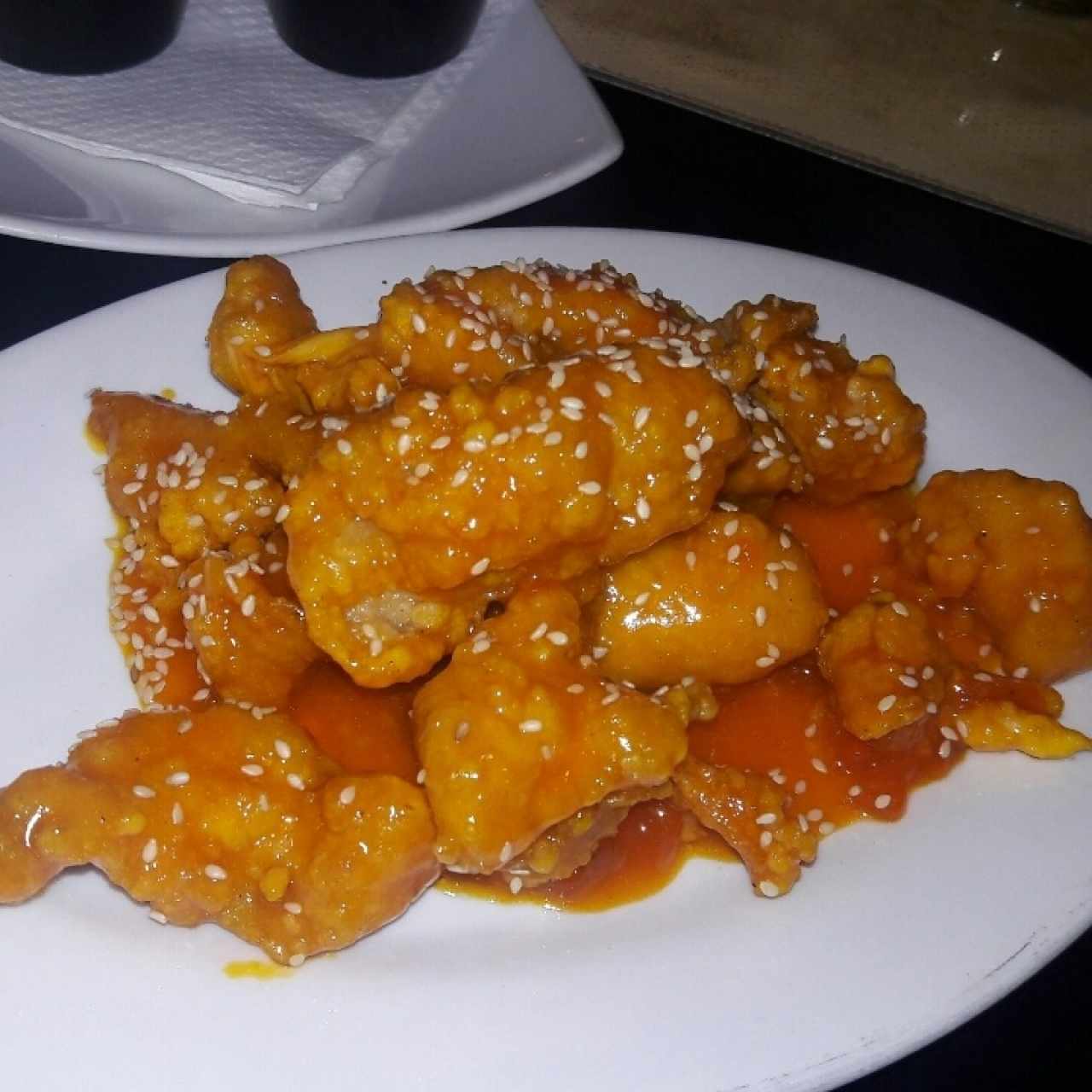 Pollo con miel y ajonjolí