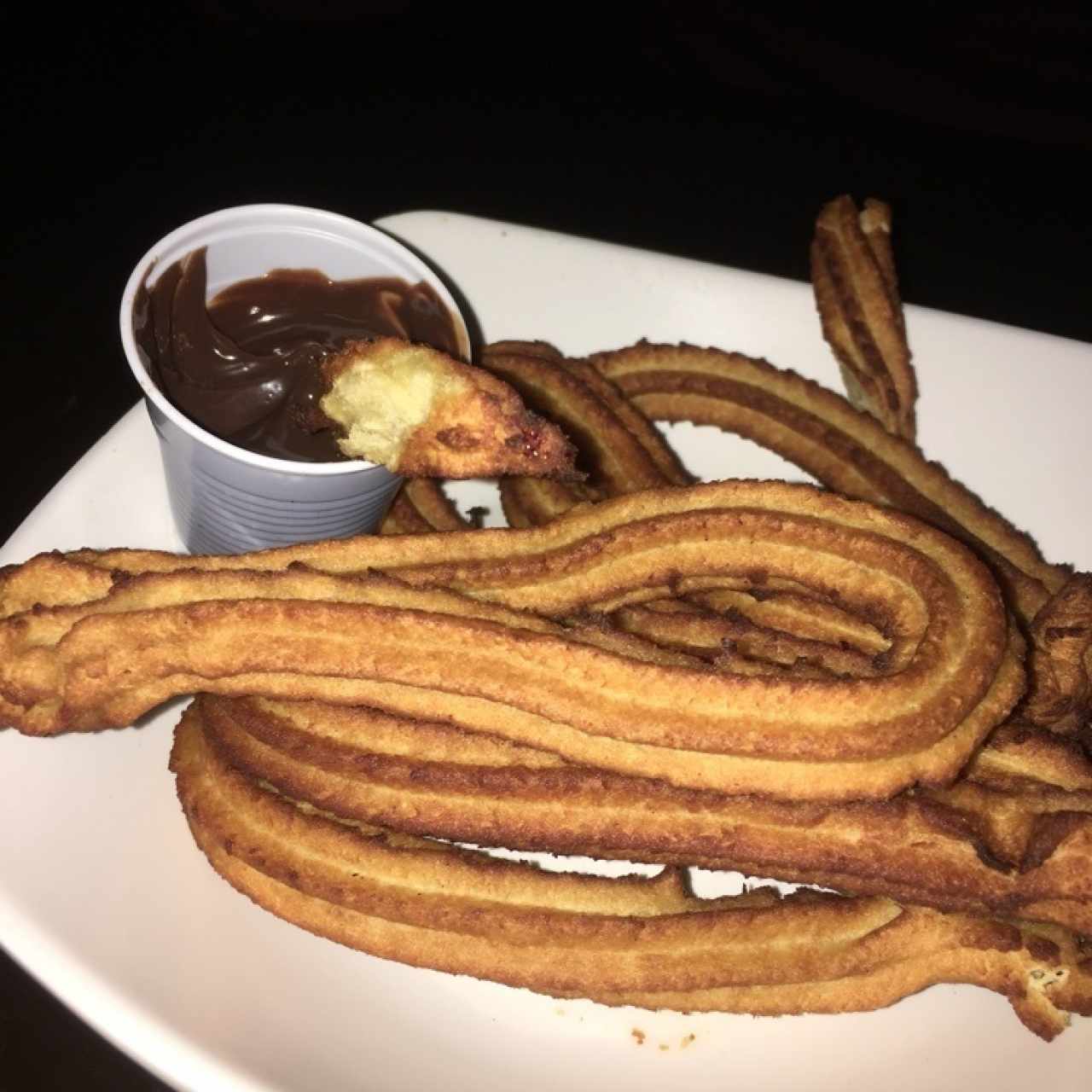 Churros con vaso mínimo de chocolate