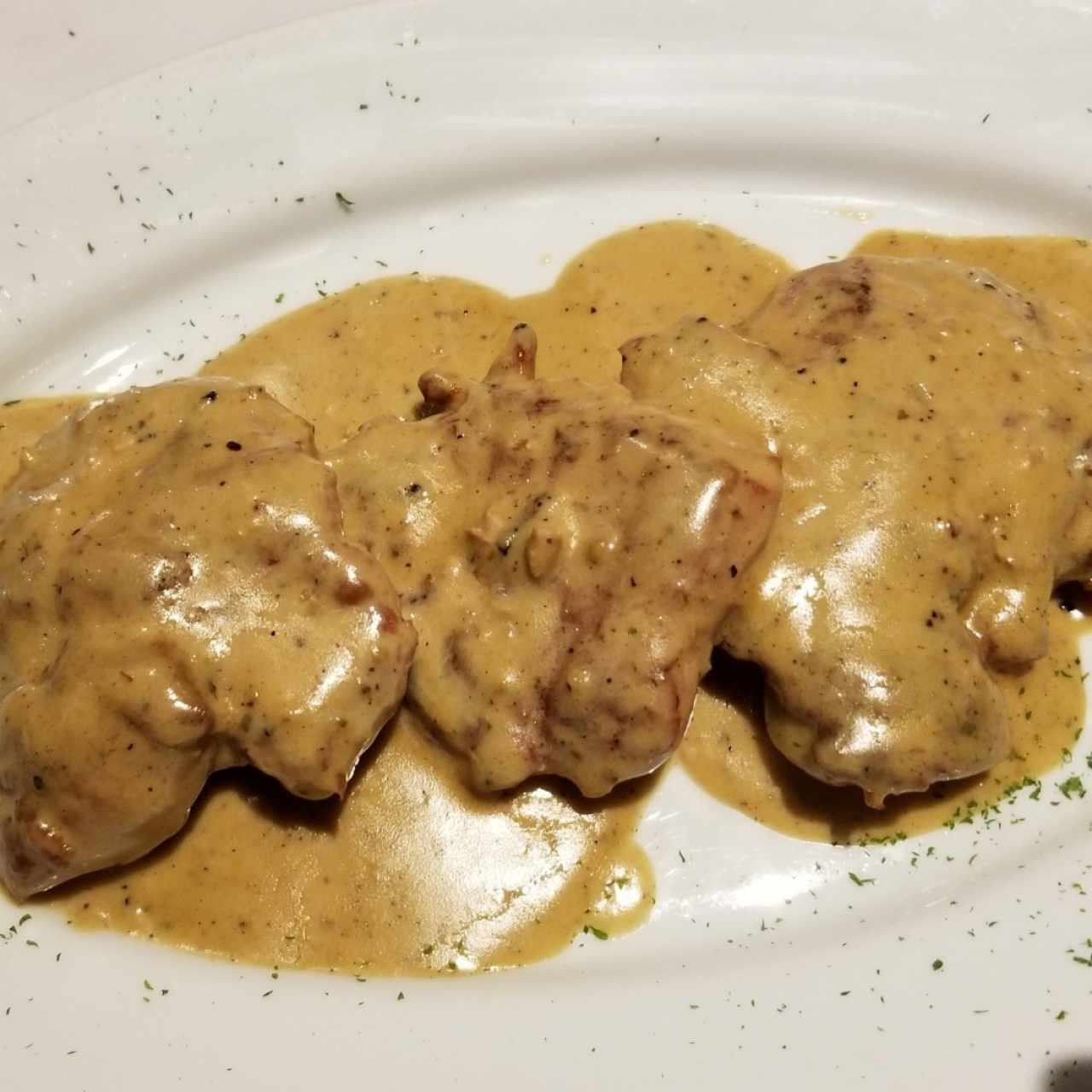 Lomo de cerdo en salsa de pimienta