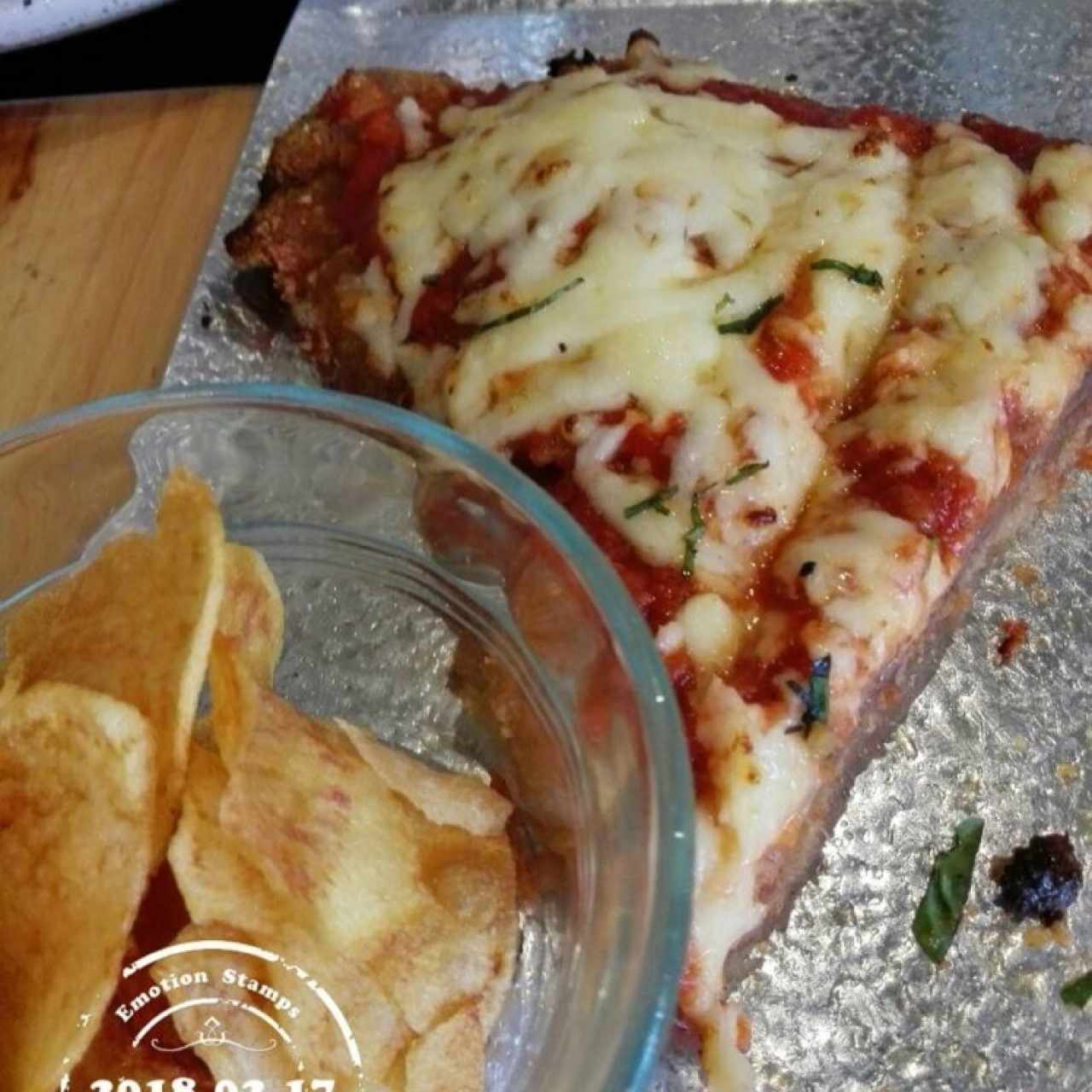 milanesa acompañada con papitas (capressa)