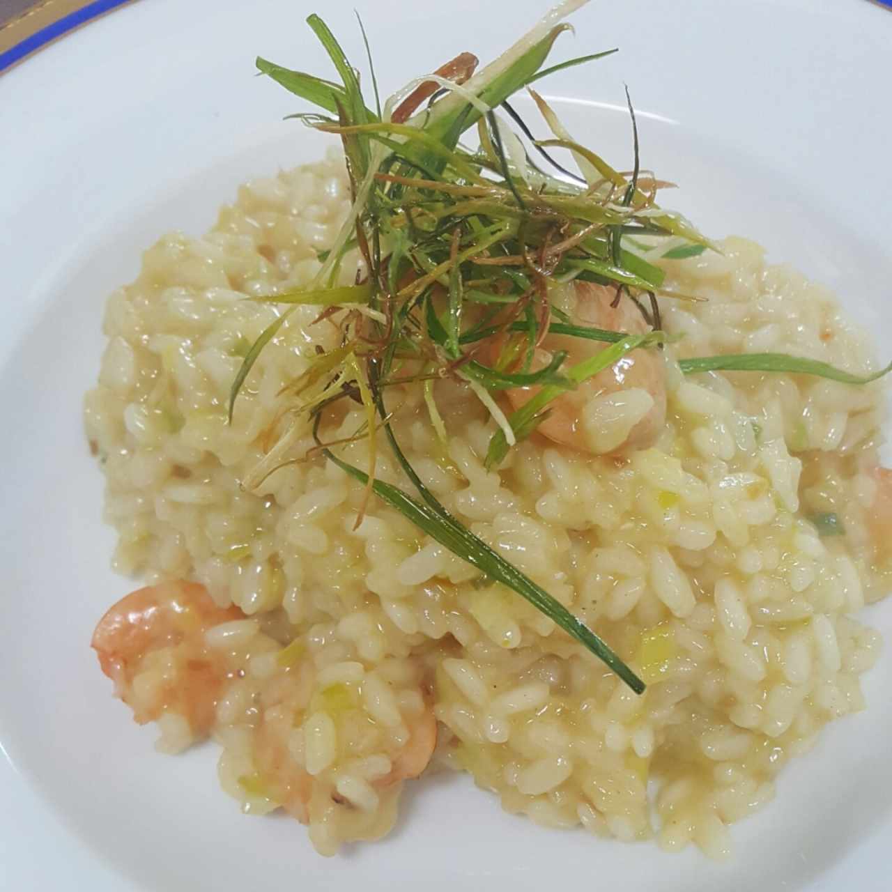 Risotto de langostinos con leche de coco y curry