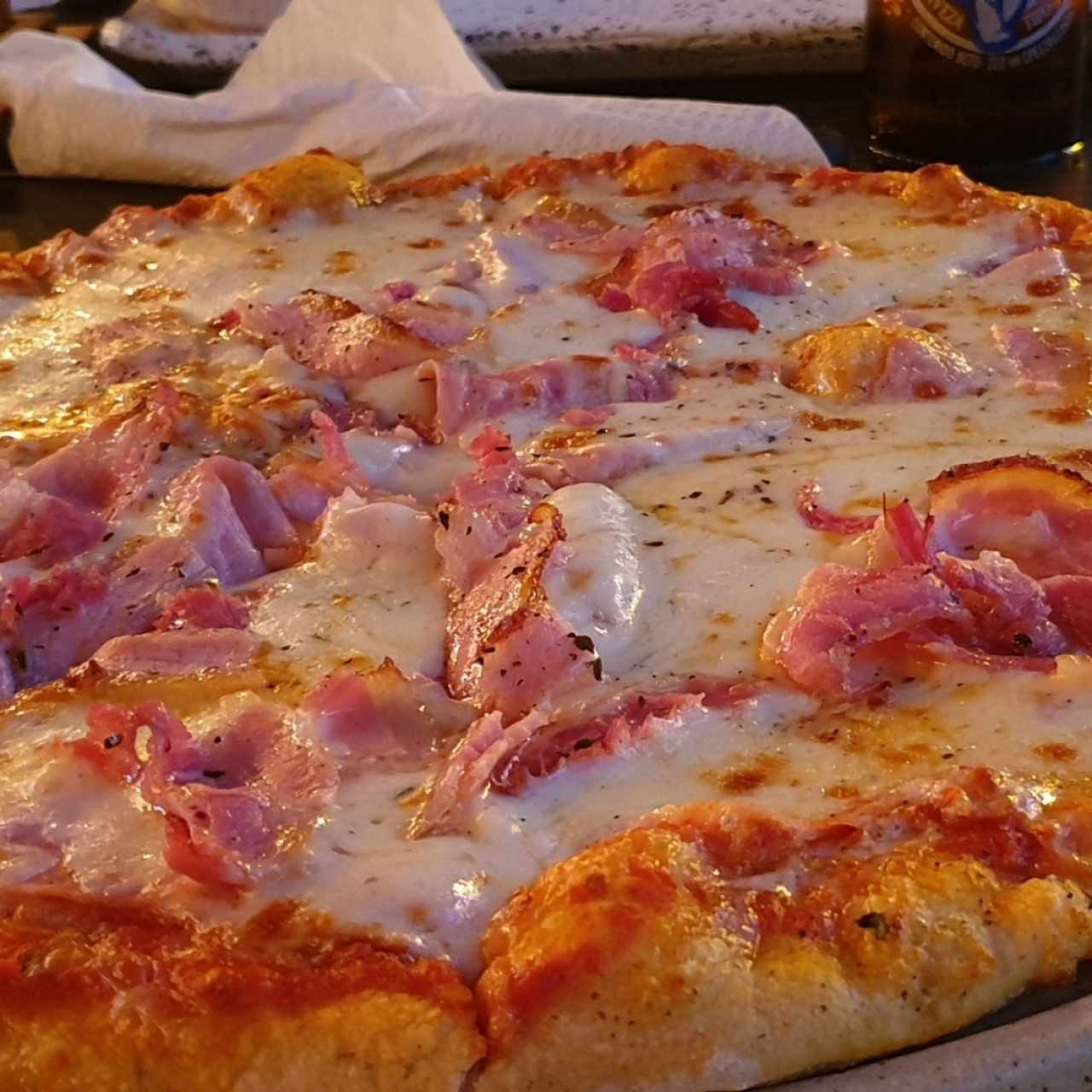 pizza prosiuto con extra tocineta 
