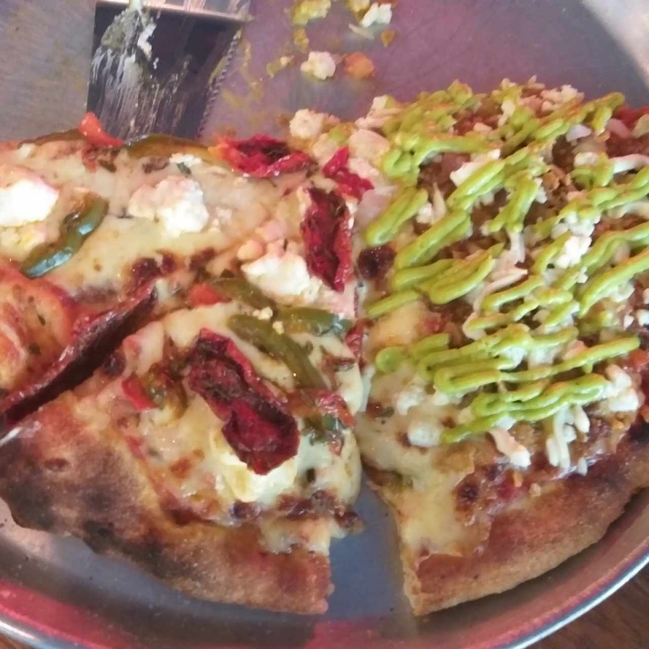 Pizza de tomates secos y taco