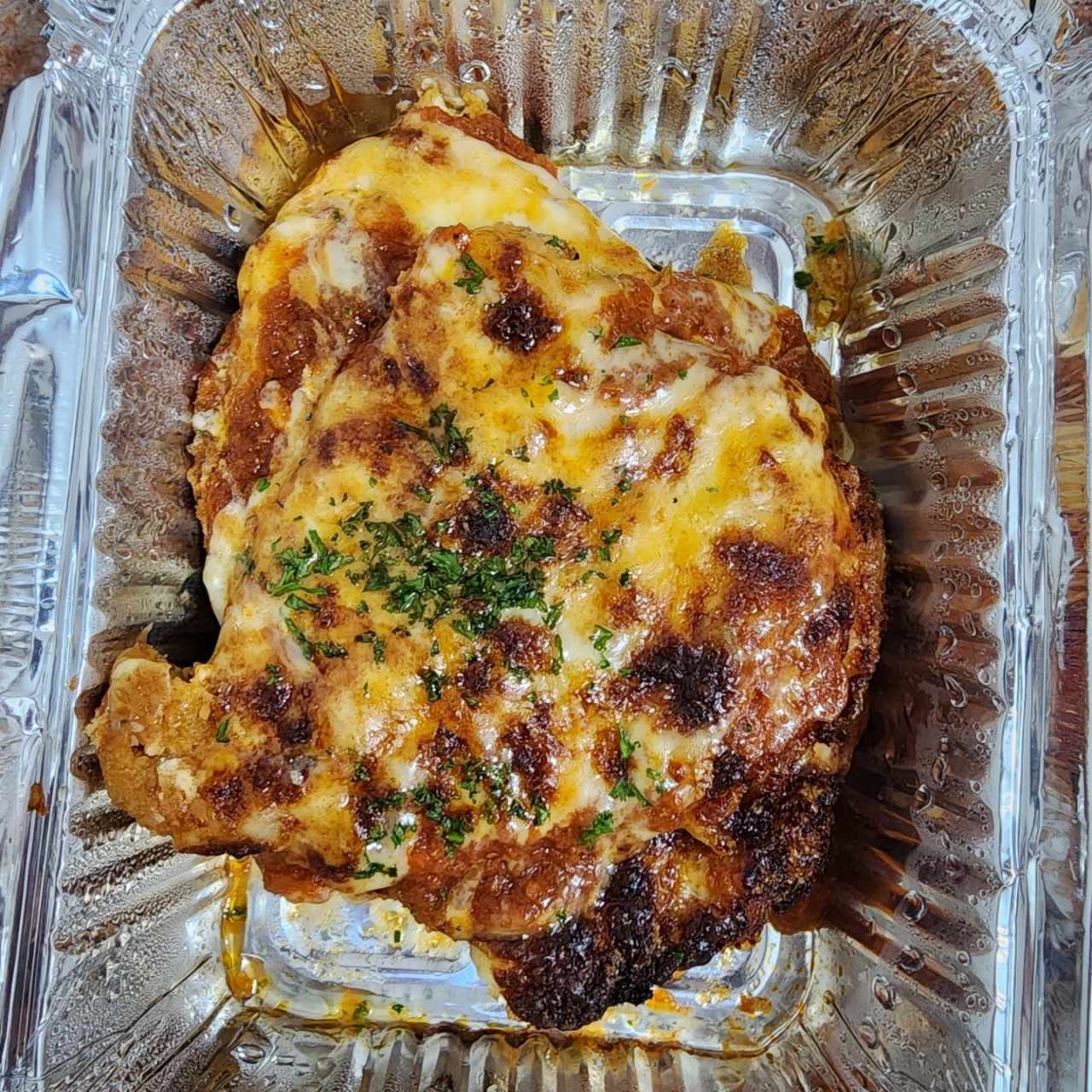 Milanesa a la parmigiana 