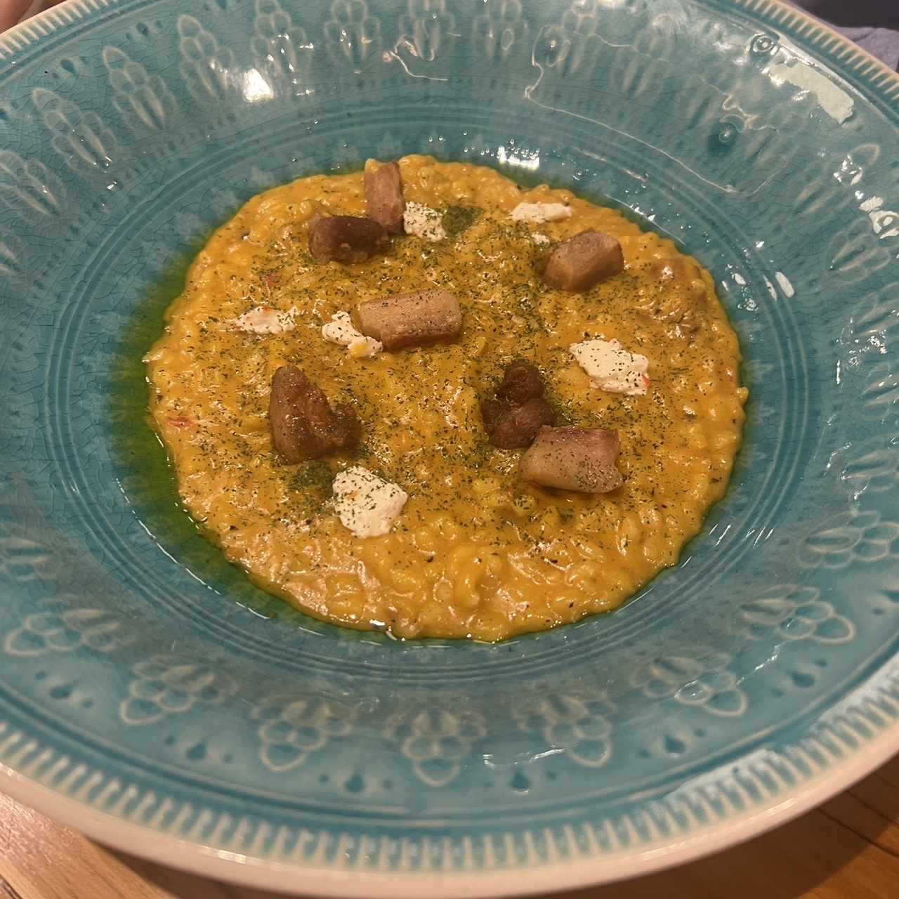 Risotto de auyama con trozos de cochino
