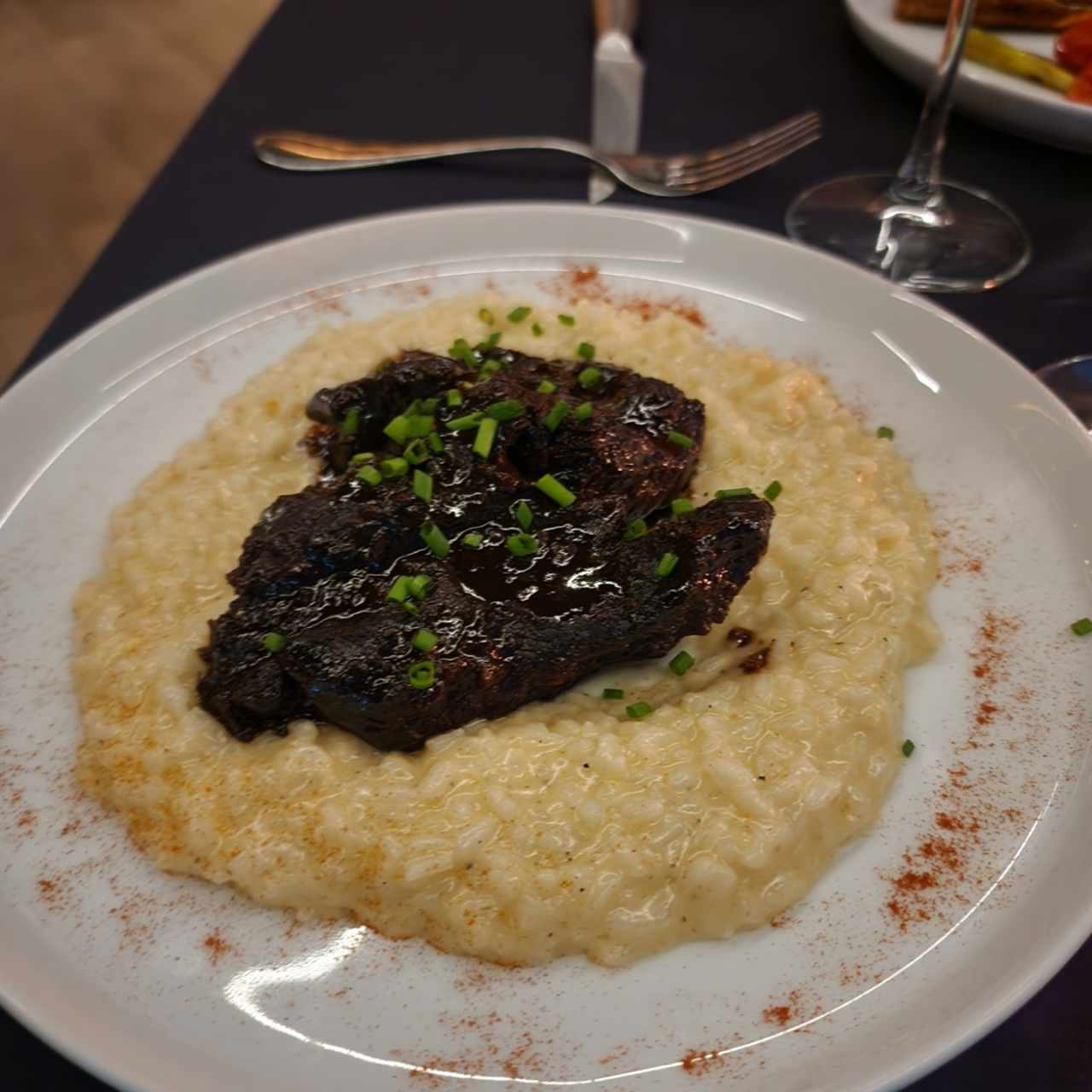 Carne en cama de risotto 