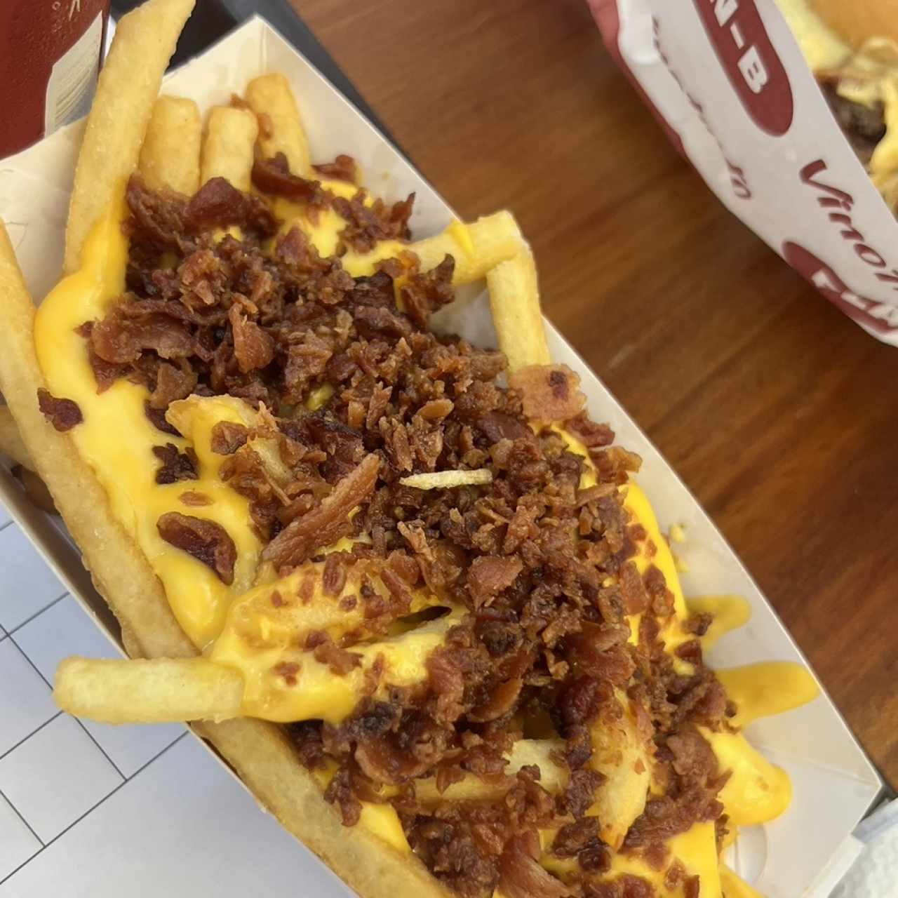Papas con Queso y Tocineta