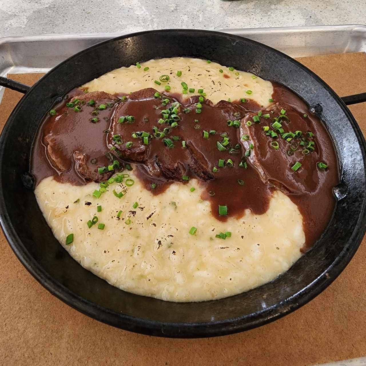 Risotto de lomito en crema de parmesano