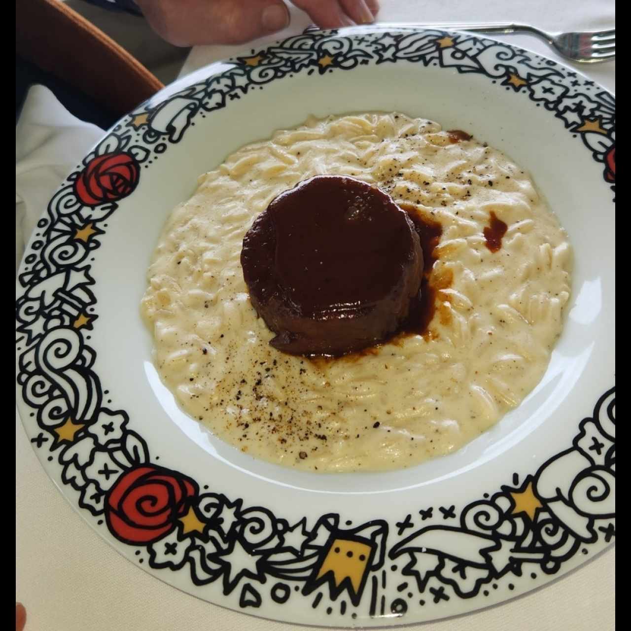 Cordero con risotto 