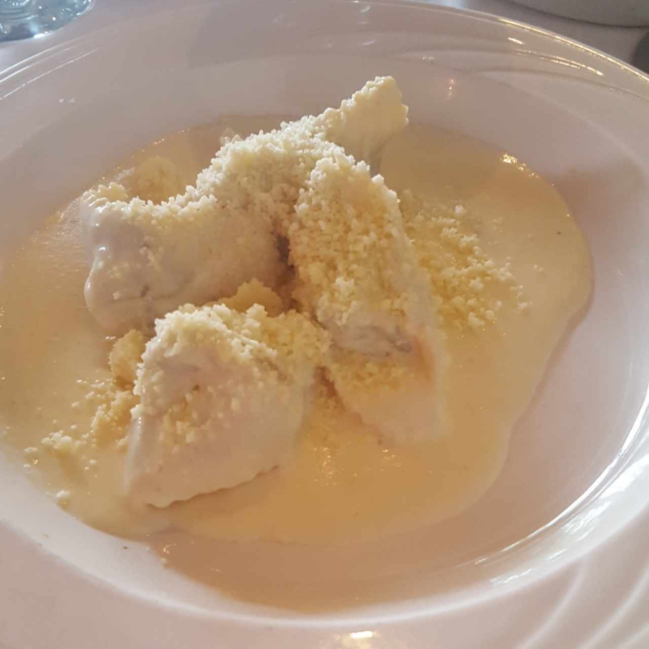 tortelonis de ricotta con espinaca a la crema.