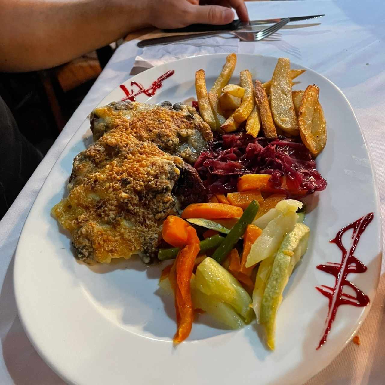 Medallones de lomito gratinados con champiñones 