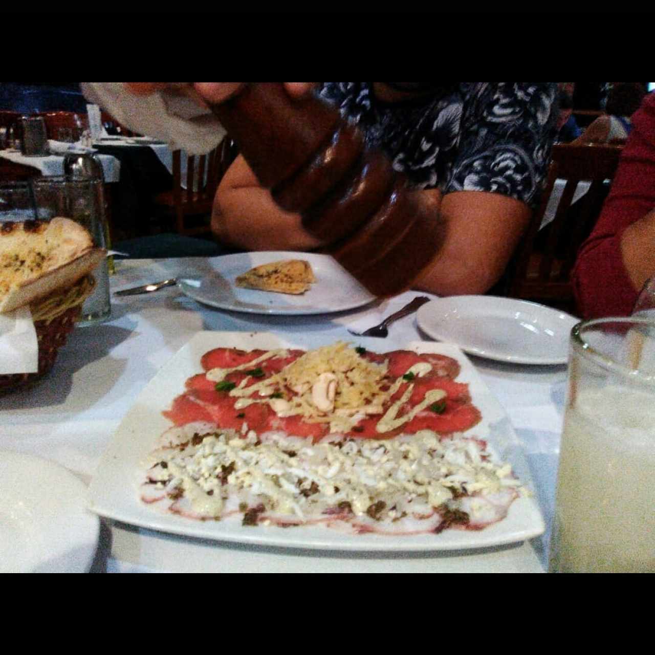 Carpaccio de pulpo y de lomito