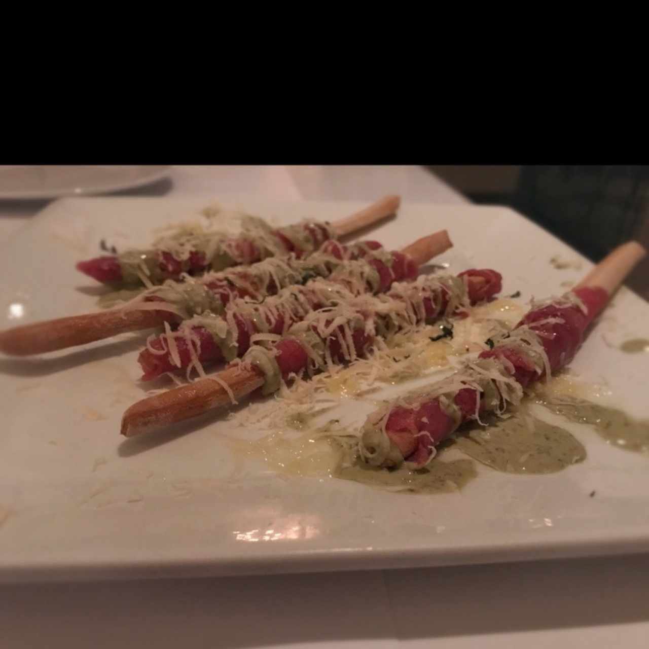 Carpaccio de Lomito en Grissini 