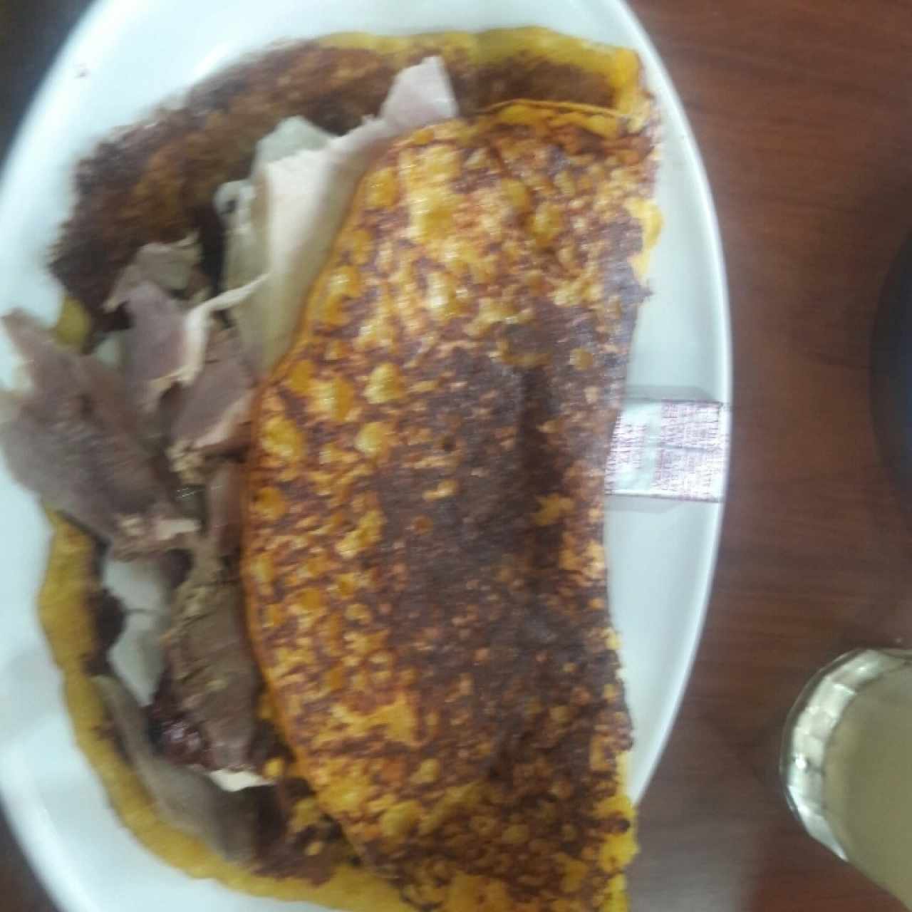 Cachapa de pernil con queso