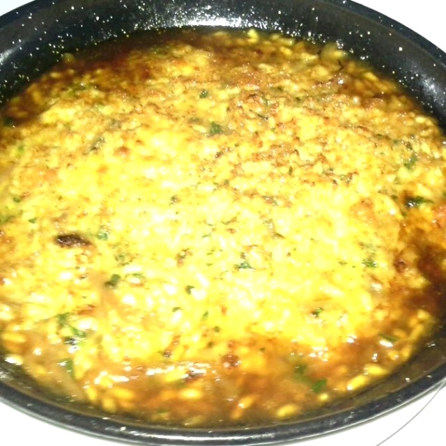 Rissoto de cebollas caramelizadas.