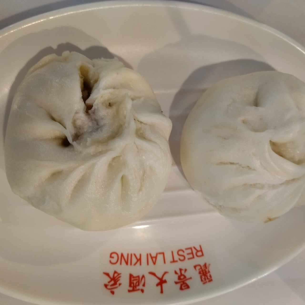 pan al vapor relleno de cerdo , bao
