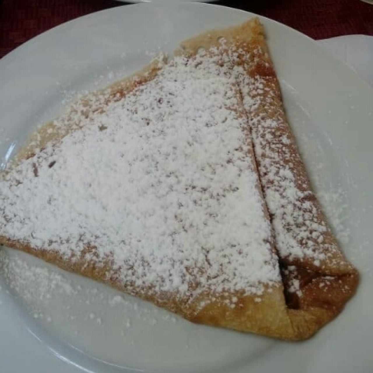 Crepes de dulce de leche y azúcar glass
