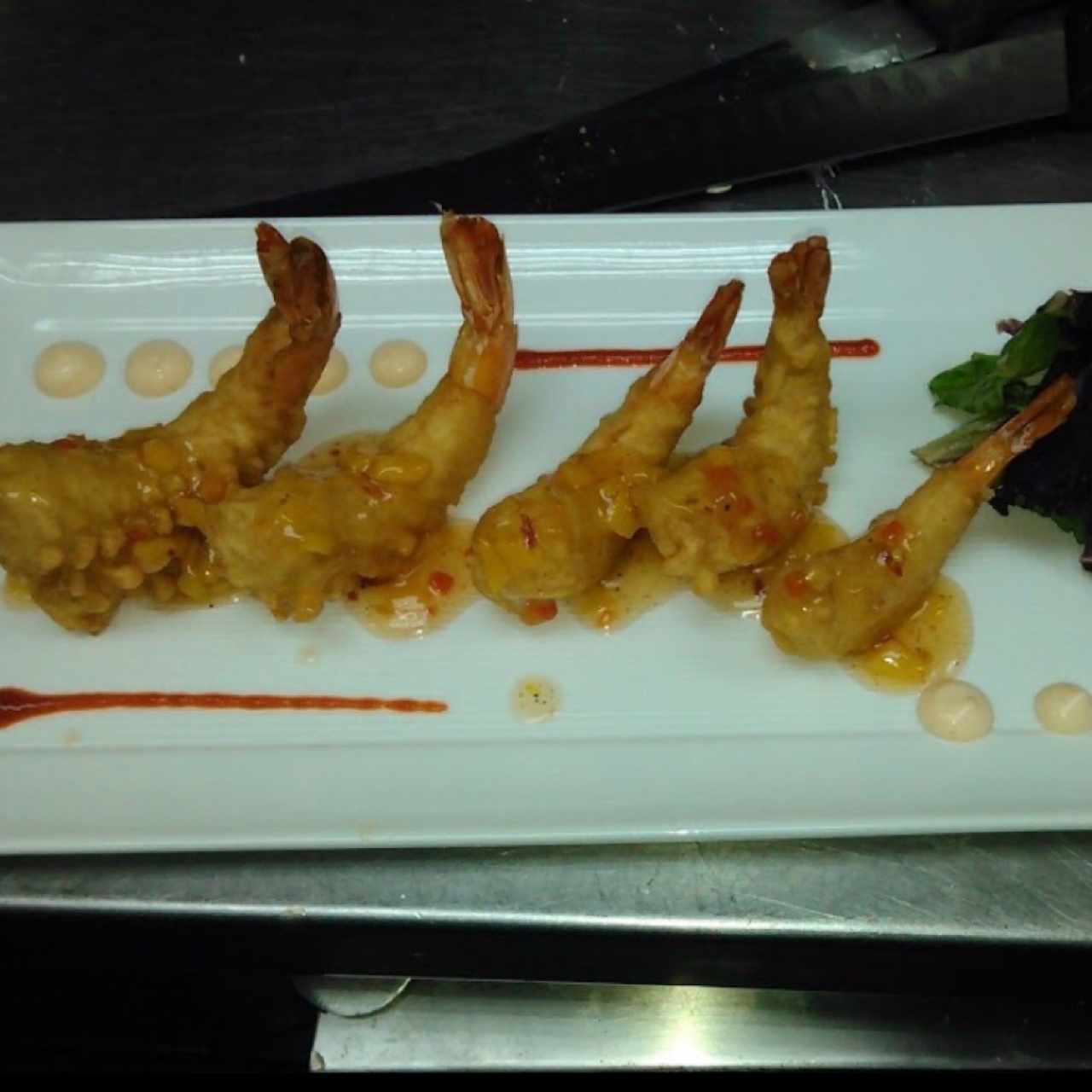 Gambas en salsa ( camarones)