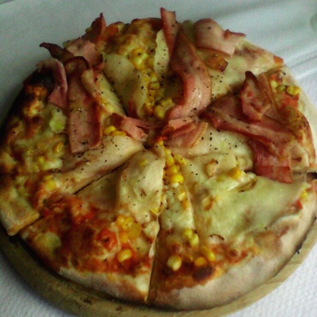 Pizza pequeña Tropical.