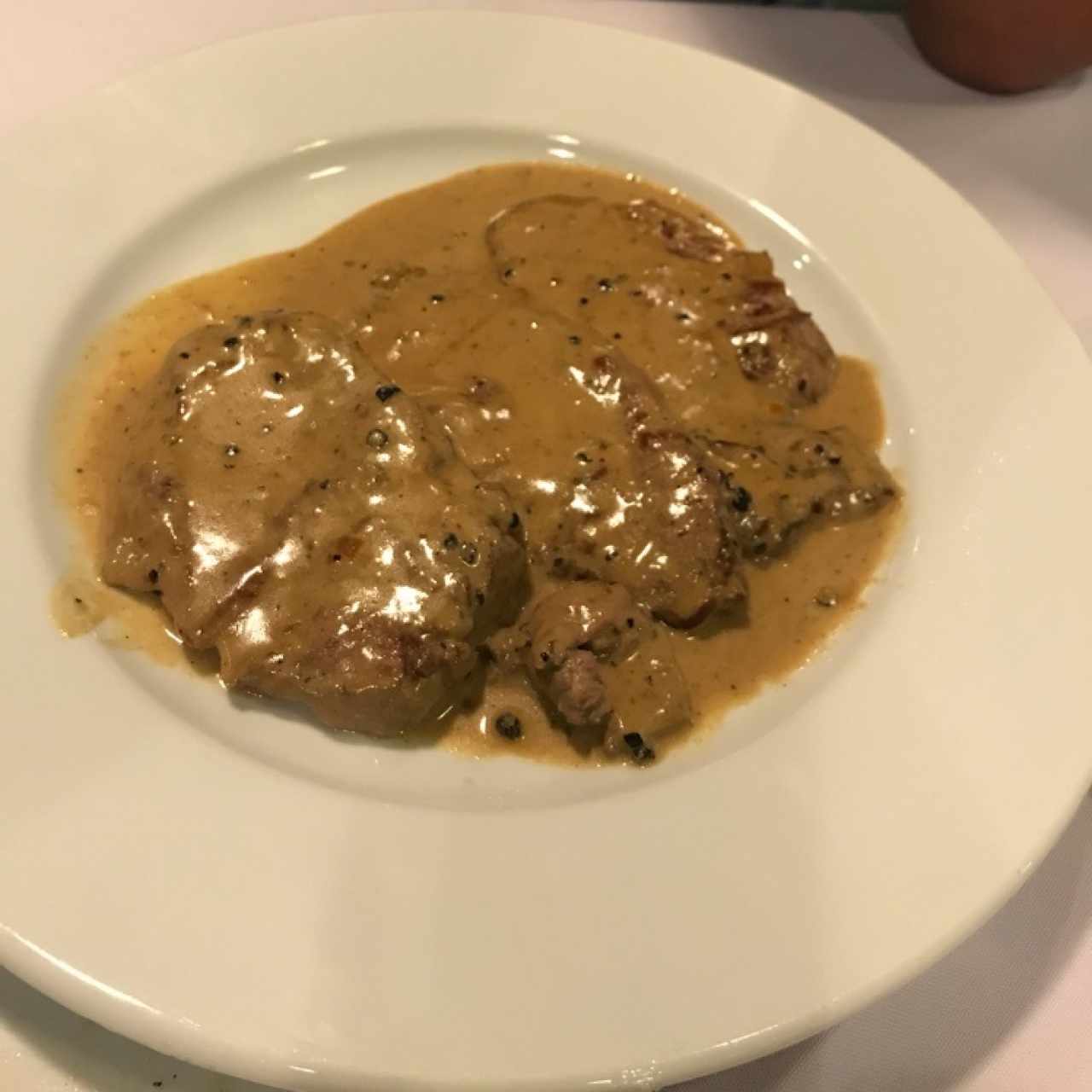 Escalipinas de lomito a la pimienta 
