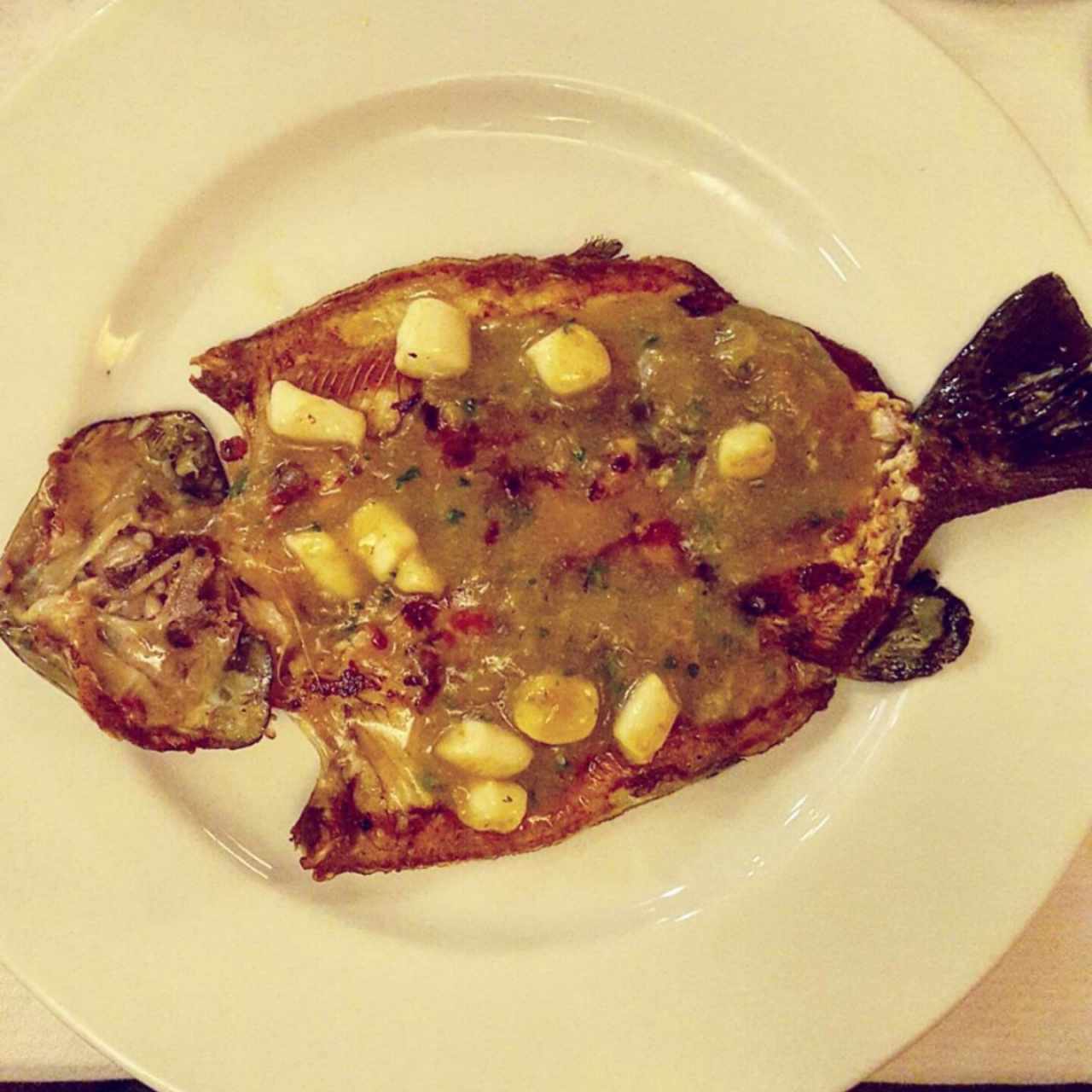 Trucha con salsa de mariscos y vieiras