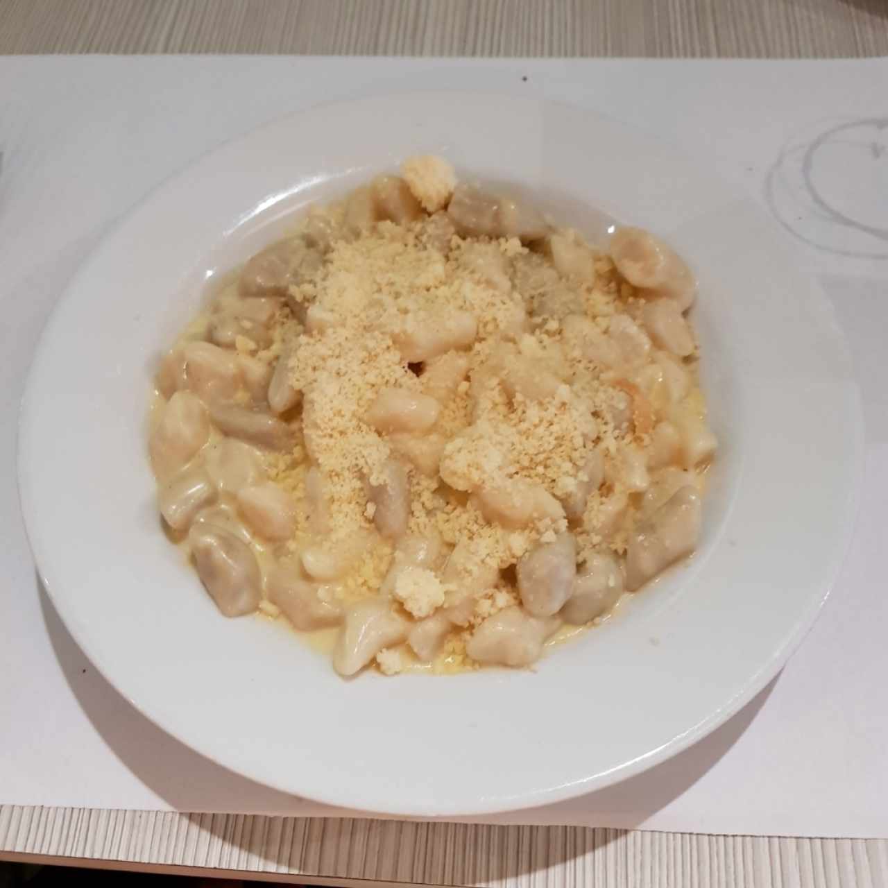 Ñoquis en salsa cuatro quesos 