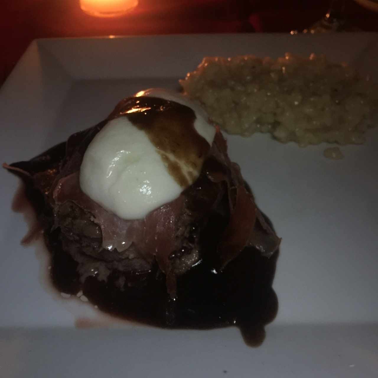 lomito envuelto de jamon serrano y queso con risotto a la parmesana