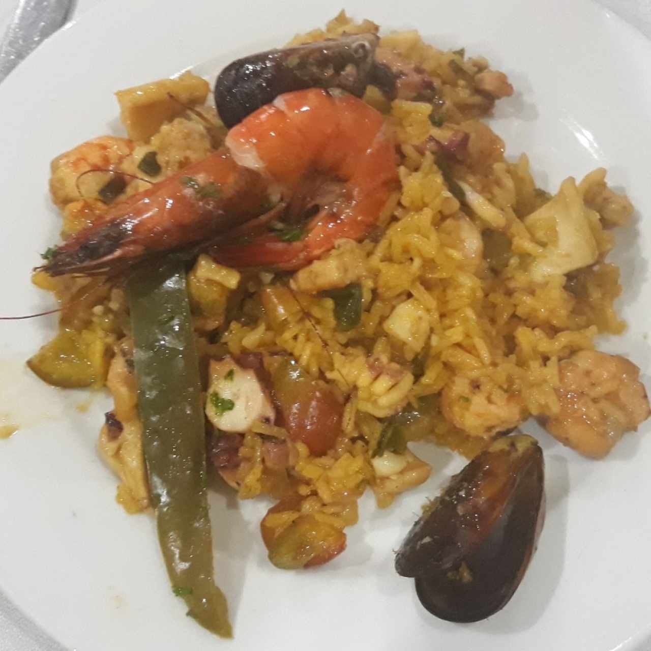 arroz a la Marinera una pequeña porción de la paella 
