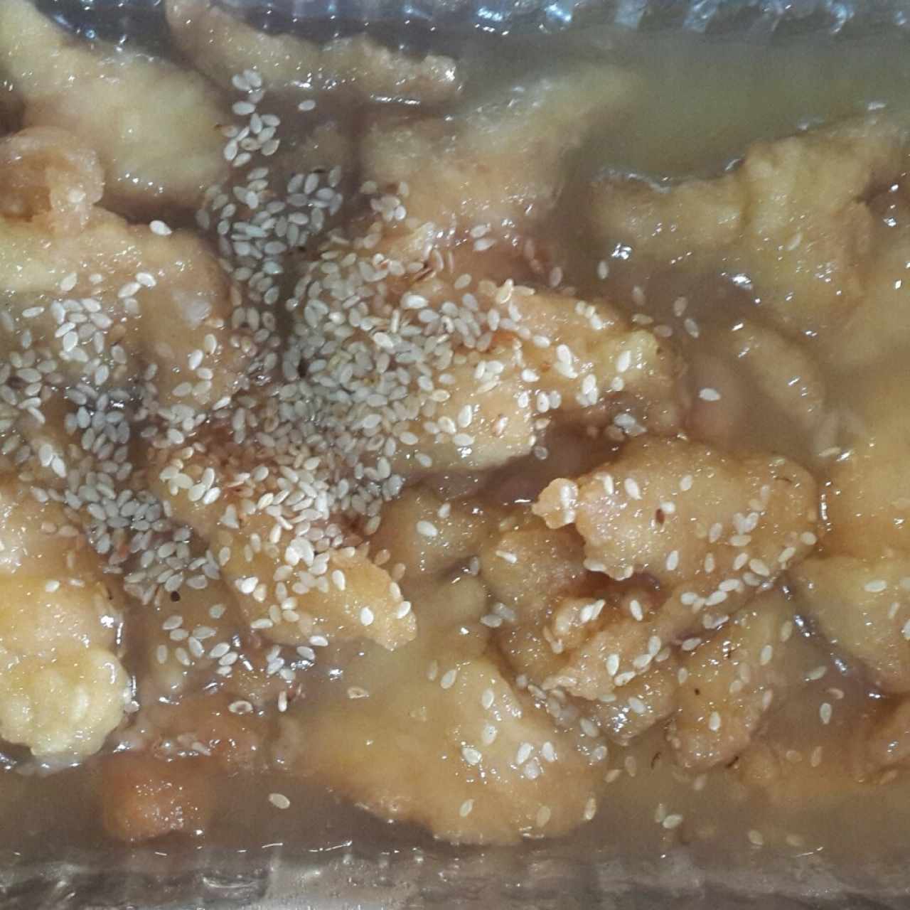 Pollo con miel y ajonjoli