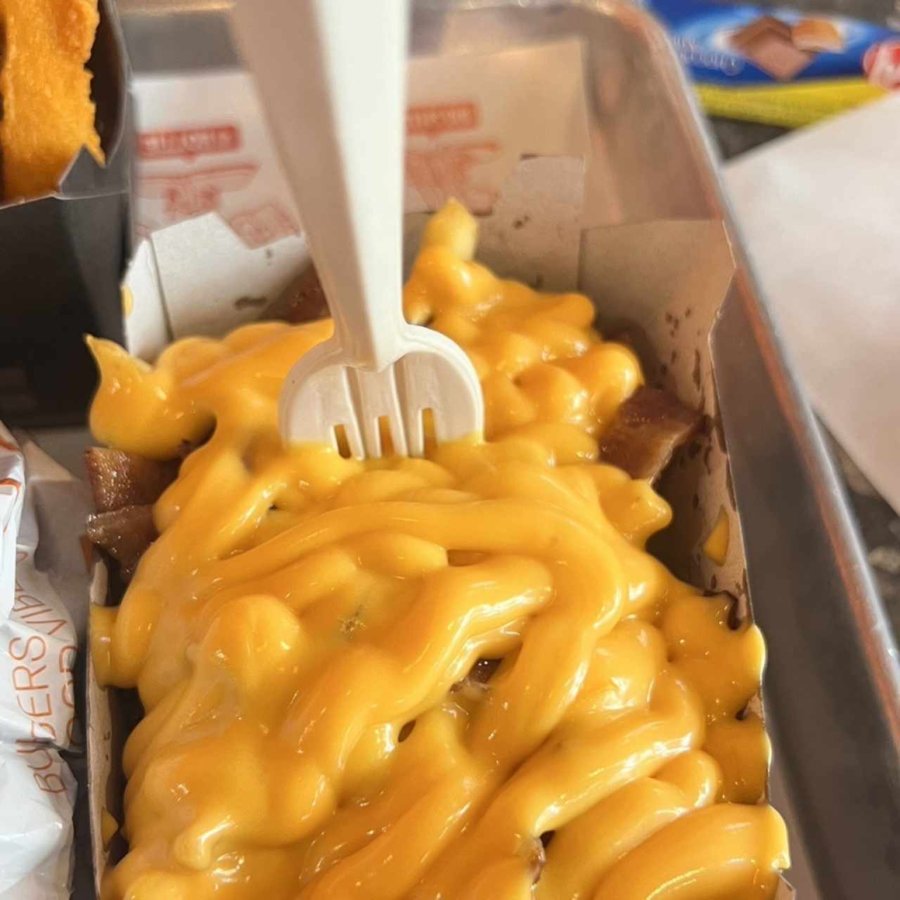 Papas con Tocineta y Queso