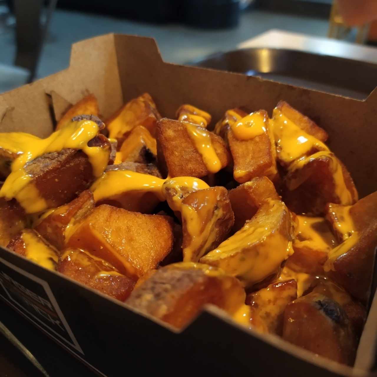 Papas con queso cheedar