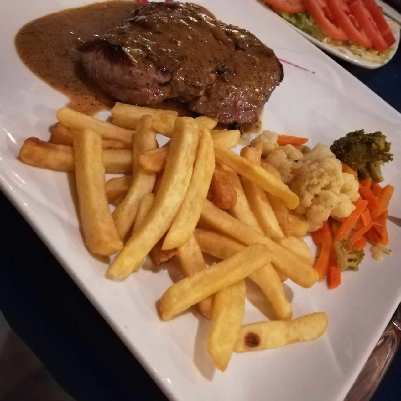 lomito en salsa de pimienta