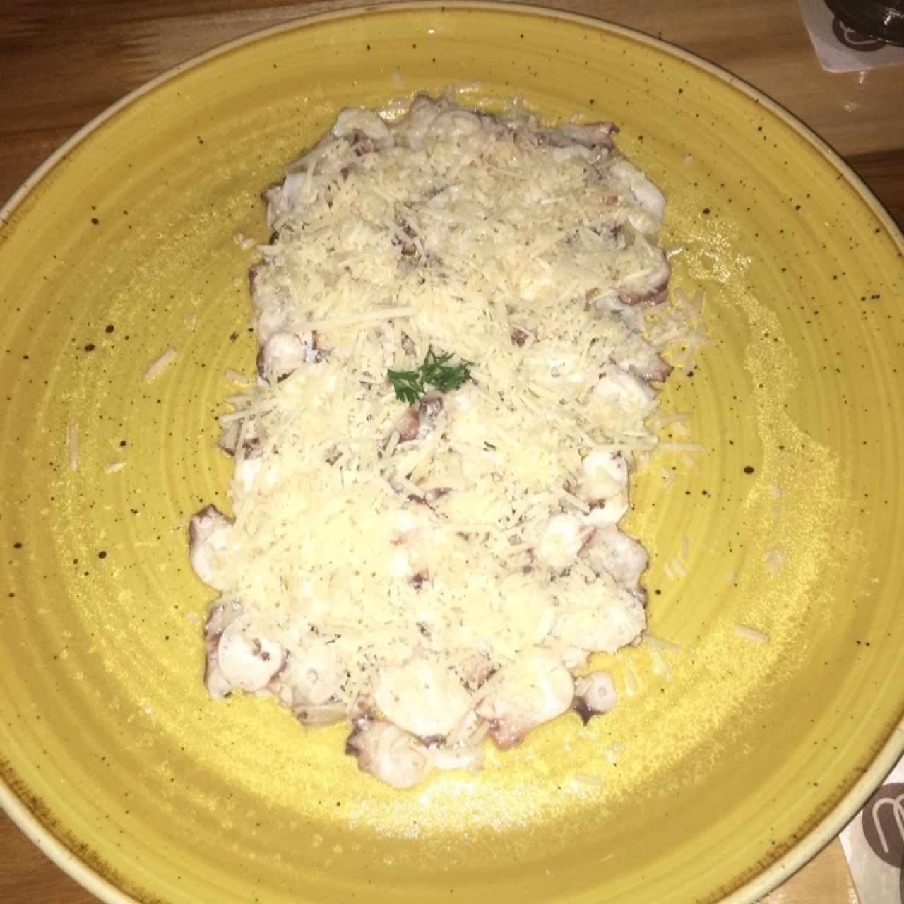 Tiradito de pulpo a la parmesana