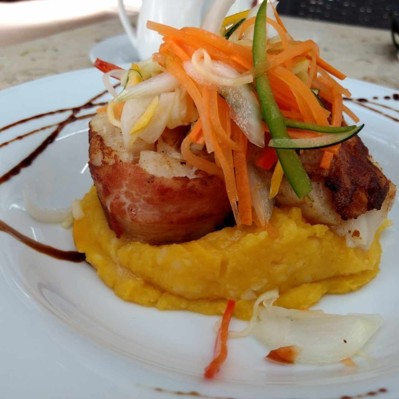 Corvina en tocineta
